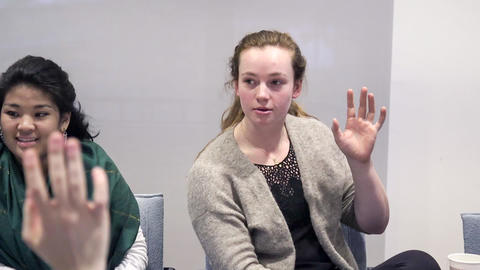 Students raising hands