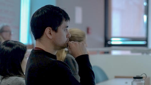 Close up of student watching Professor Grotzer, with hand up at chin.