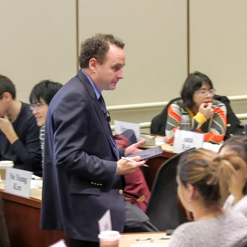 Dan Levy circulating the classroom