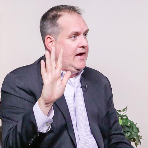 Professor McCarthy raising his hand